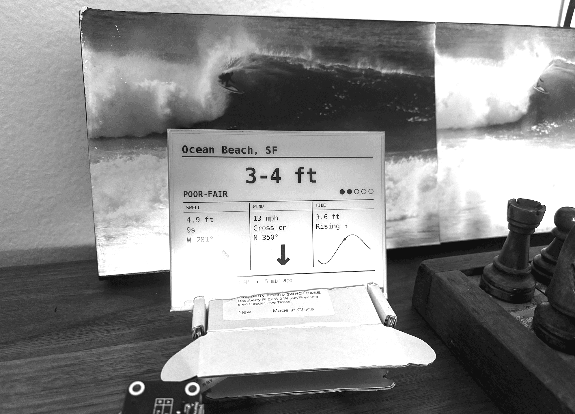 SurfFrame e-ink display showing the Ocean Beach surf report